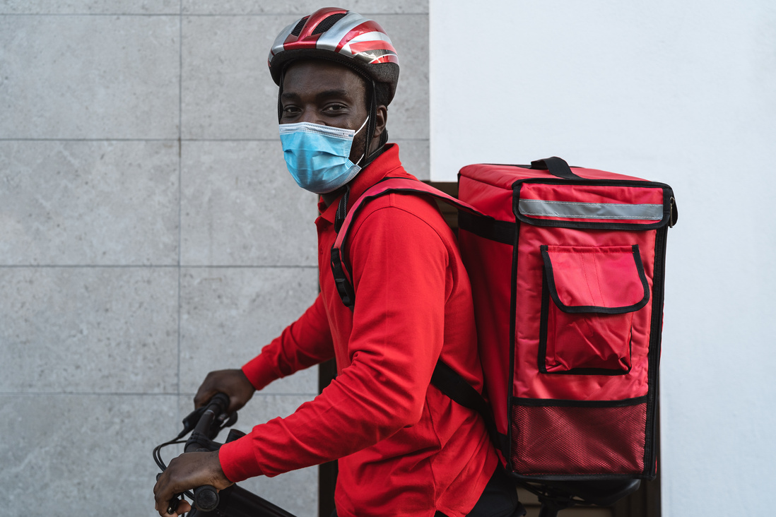 Delivery Man in Electric Scooter